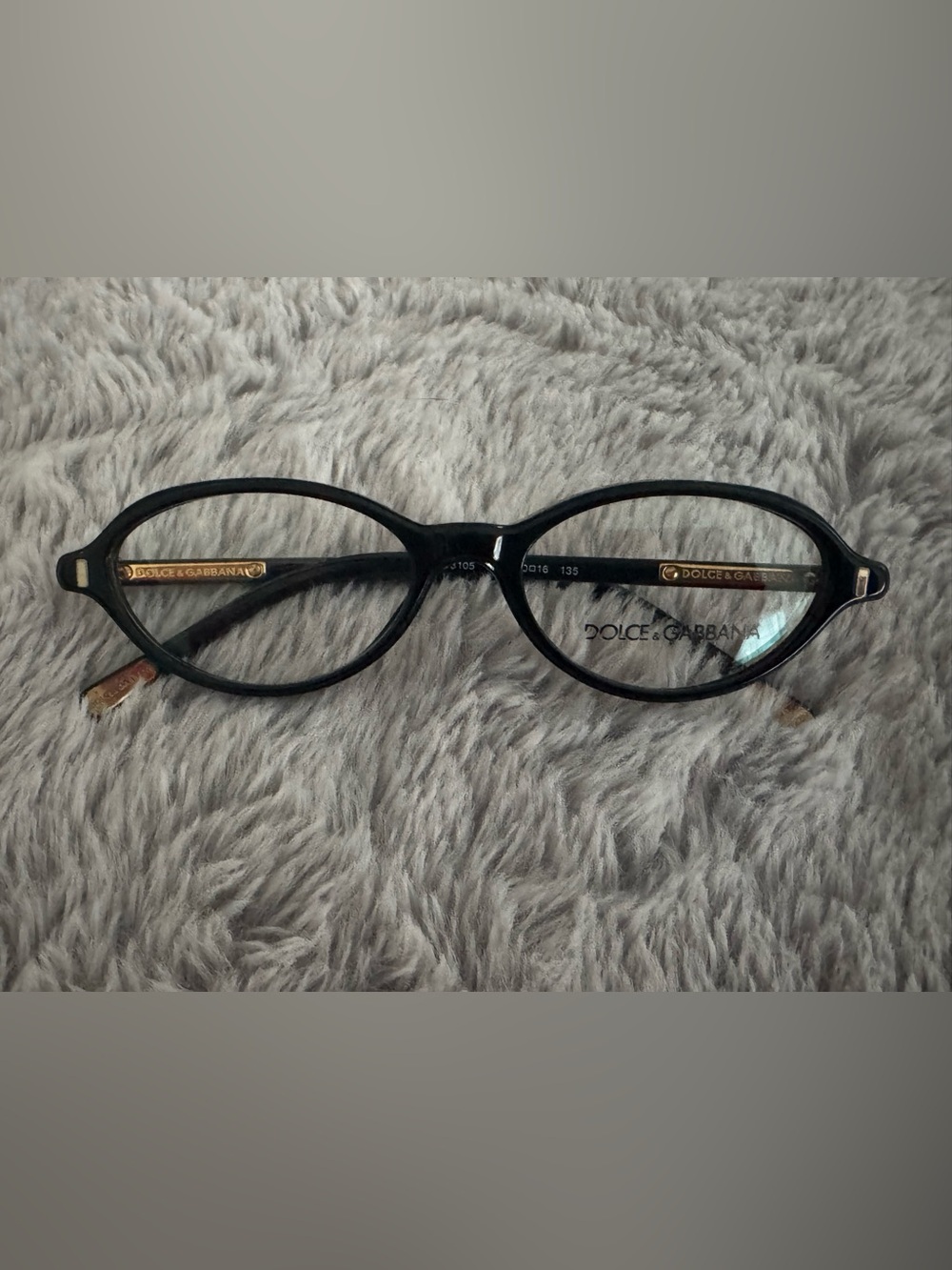 Dolce & Gabbana Black Oval Optical Frames with Gold Temple Accents